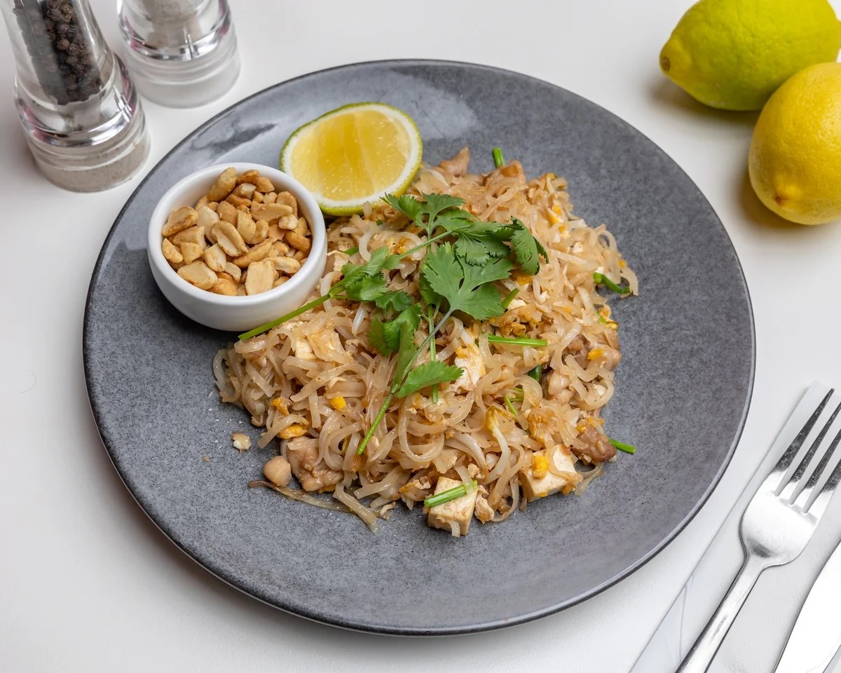 A plate of chicken Pad Thai with peanuts, lime and coriander at Rim Thang Thai, Glenelg